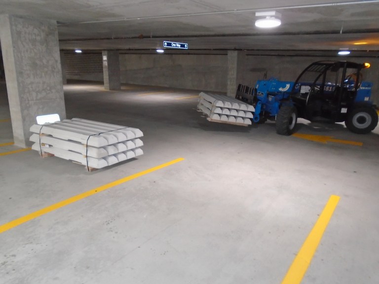 Parking Curbs installed in Parking garage by CURBO